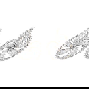 Verdura Pair of Platinum and Diamond 'Nautilus' Shell Earclips: 18 kt., 170 round diamonds weighing 5.99 cts., signed Verdura, ap. 16.8 dwts. With copy of Verdura invoice. Diamonds: G-H-VS. 18 kt. white gold clip-backs. 1 1/8 x 7/8 inches.