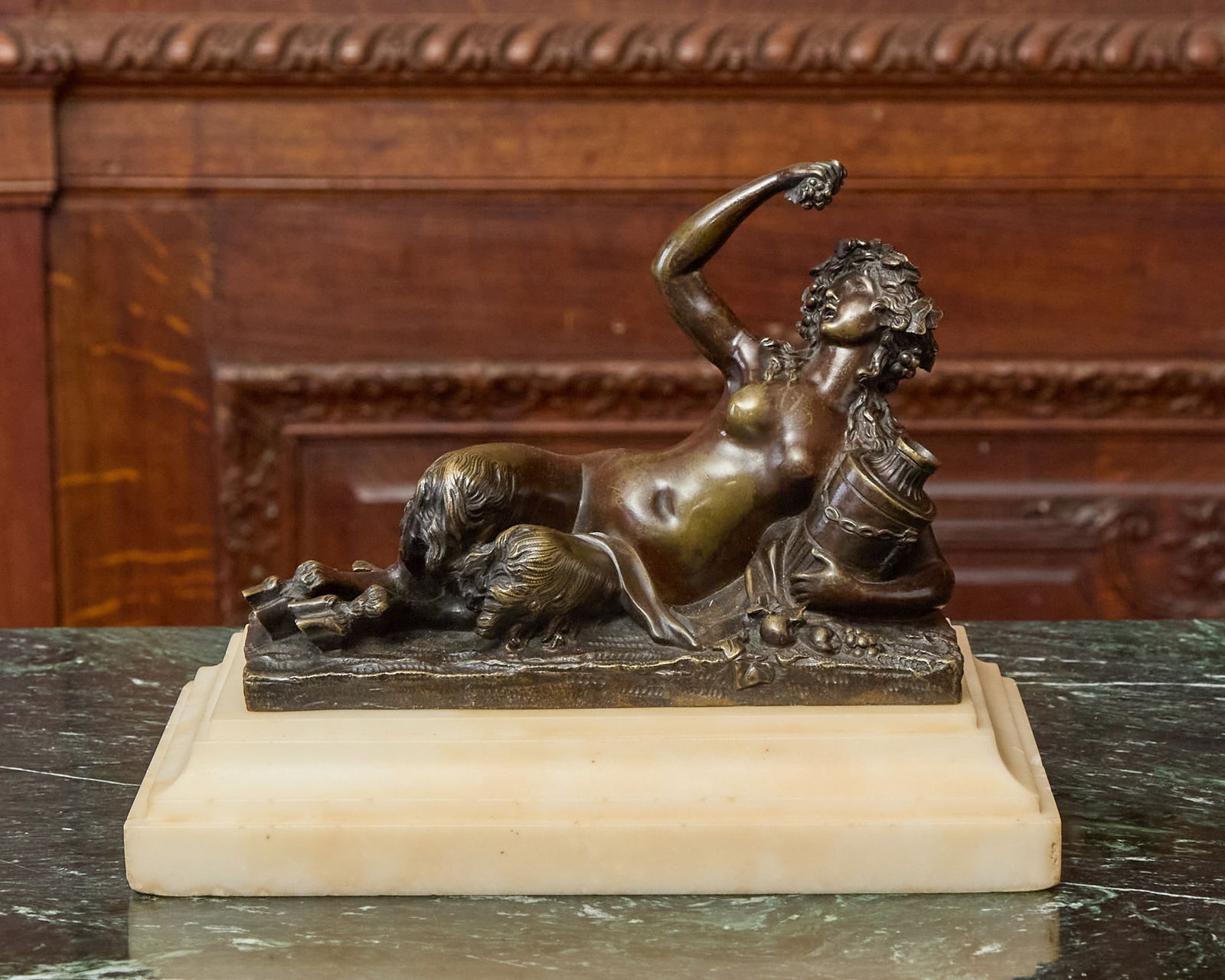 Bronze Figure of a Reclining Satyresse French 18th century, After a model by J-L. Marin (1 of 2)