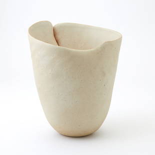 Richard DeVore Glazed Stoneware Vessel Last quarter 20th century: With a crimped and pincered body, irregular rim, ivory colored glaze on the exterior, ivory and pale salmon pink colored glaze on the interior, numbered 579, otherwise, unmarked. Height 9 1/4 inches,