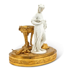 Continental Gilt-Bronze and Bisque Porcelain Figure