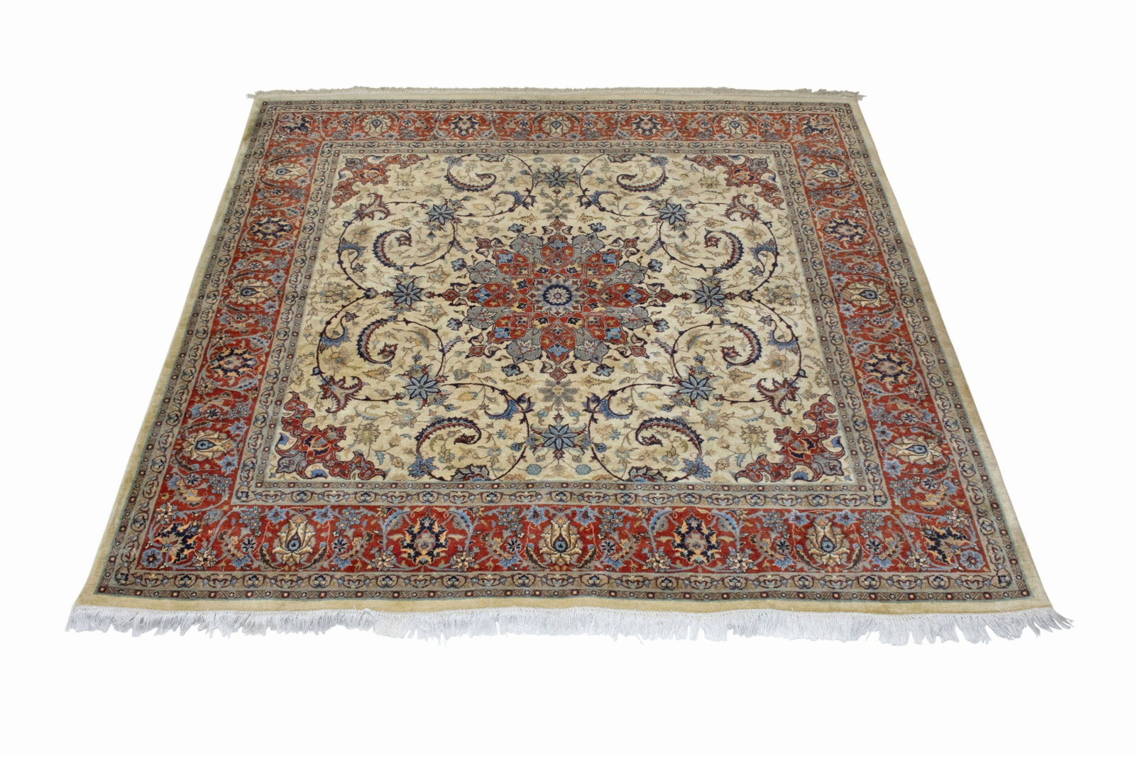 Indo-Isfahan Rug: India, Contemporary The central circular medallion on the ivory field is within a scarlet palmette and leafy vine border, approximately 256 kpsi. (7' 1" x 6' 10") Stains, soiled, reselve