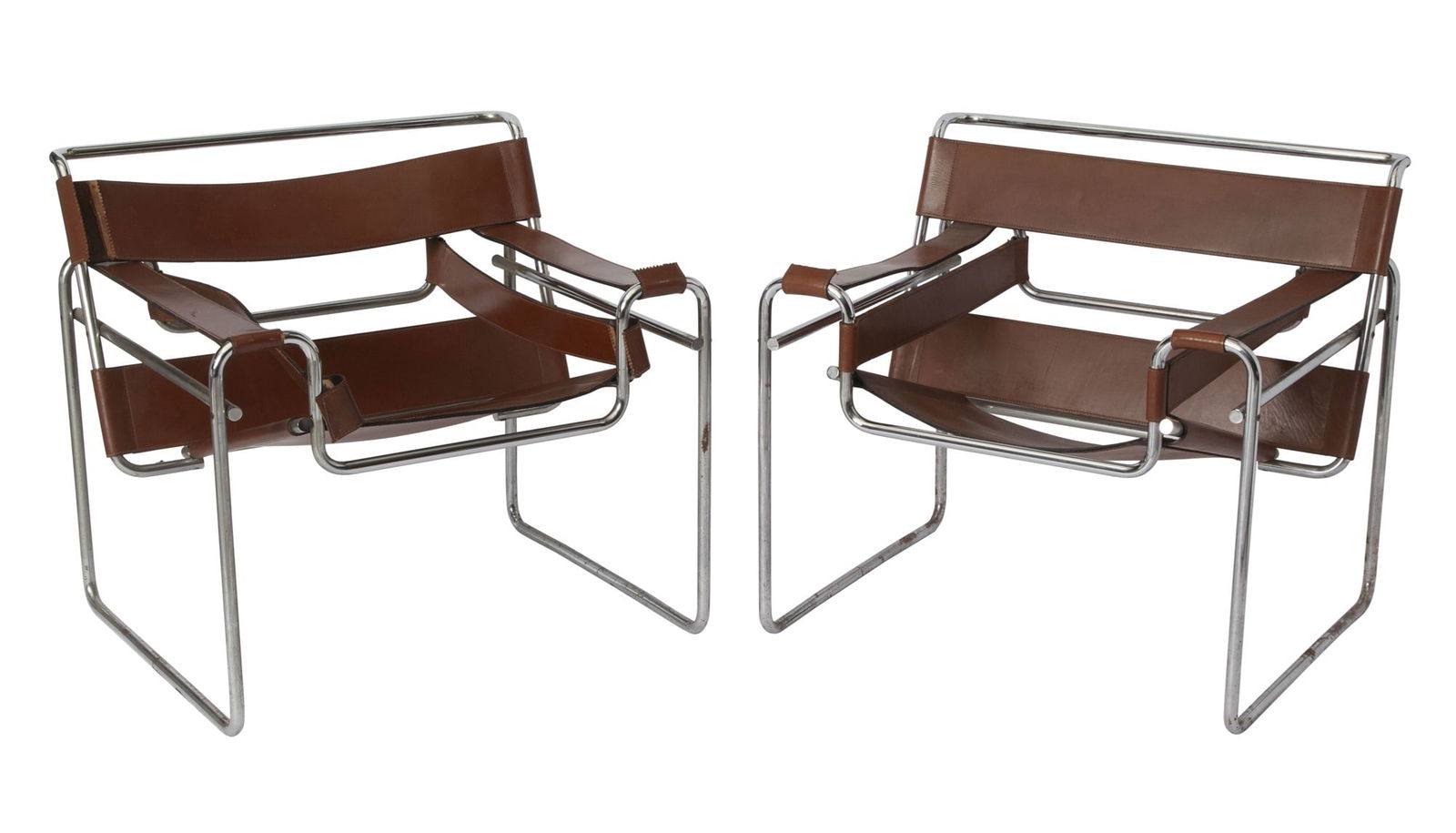 Pair of Marcel Breuer Leather and Chromed Metal "Wassily" Armchairs Gavina, 20th century: Height of back 28 inches, height of seat 16 3/4 inches, width 31 inches, depth 27 inches. Breaks to leather; rusting to frames; estate condition