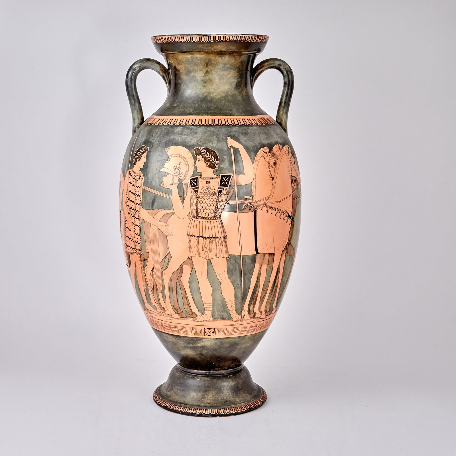 Ancient Greek Style Porcelain Neck Amphora: Depicting a warrior departing on a four-horse chariot. Height 24 1/2 inches. Crazing throughout decoration.