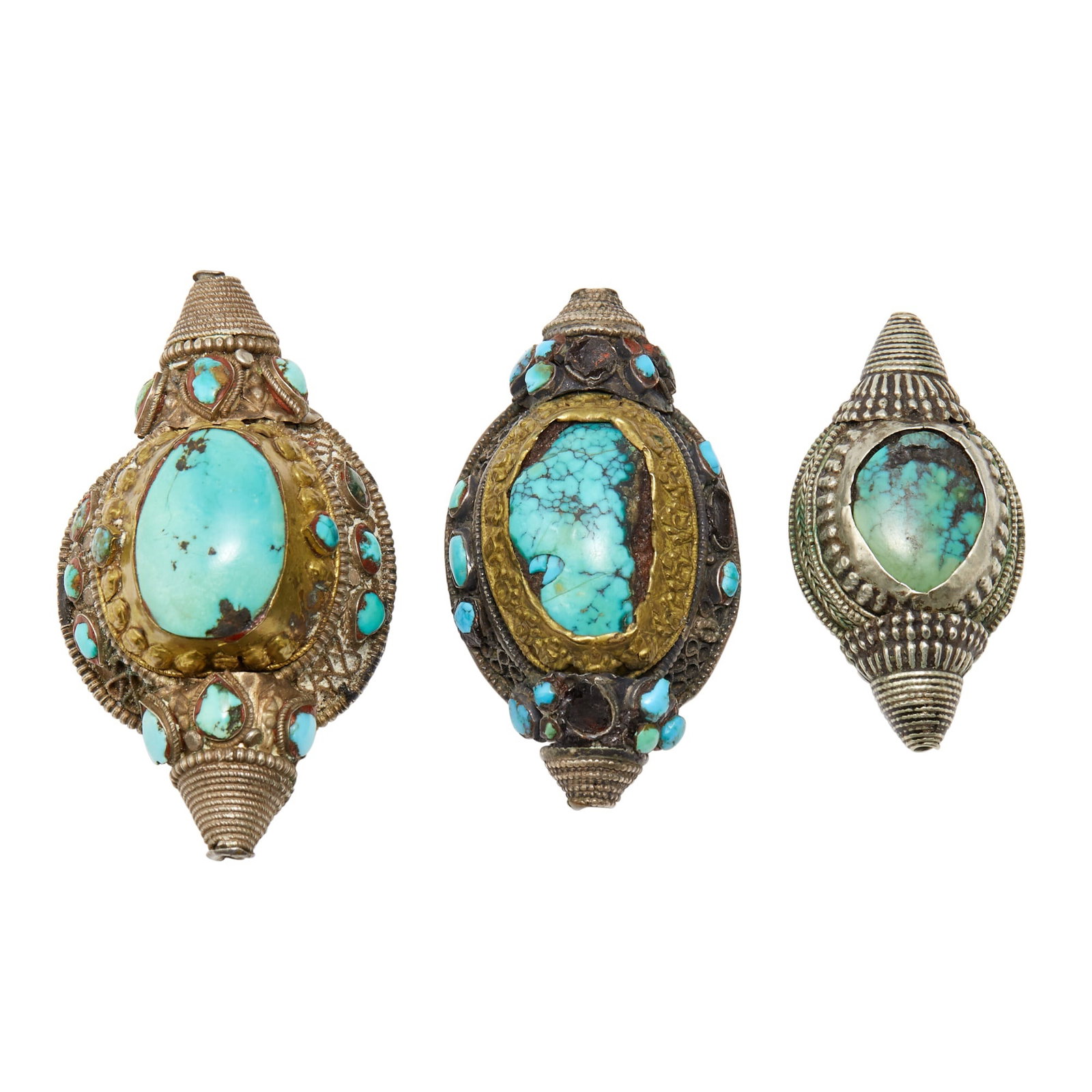 A Group of Tibetan Turquoise-Mounted Hair Ornaments 18th-19th Century: Comprising three white and parcel gilt metal conch-form ornaments set with turquoise. Length of Largest 3 inches