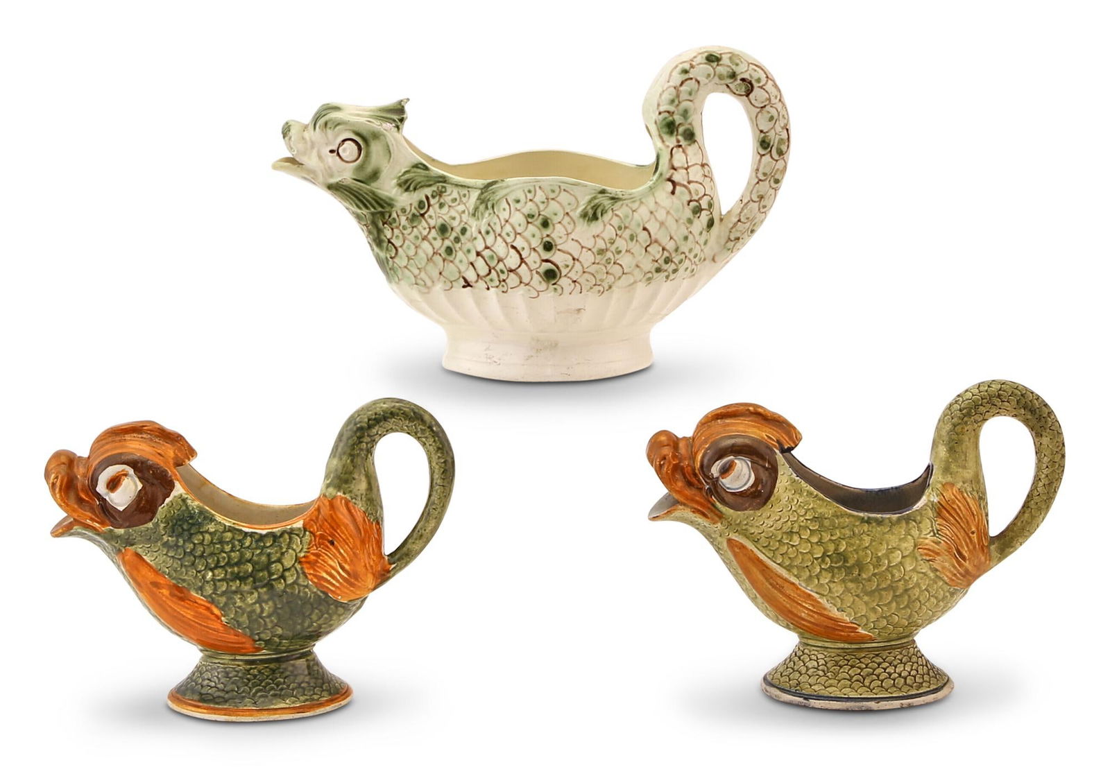 Group of Three English Pearlware and Creamware Dolphin-Form Sauceboats (1 of 2)