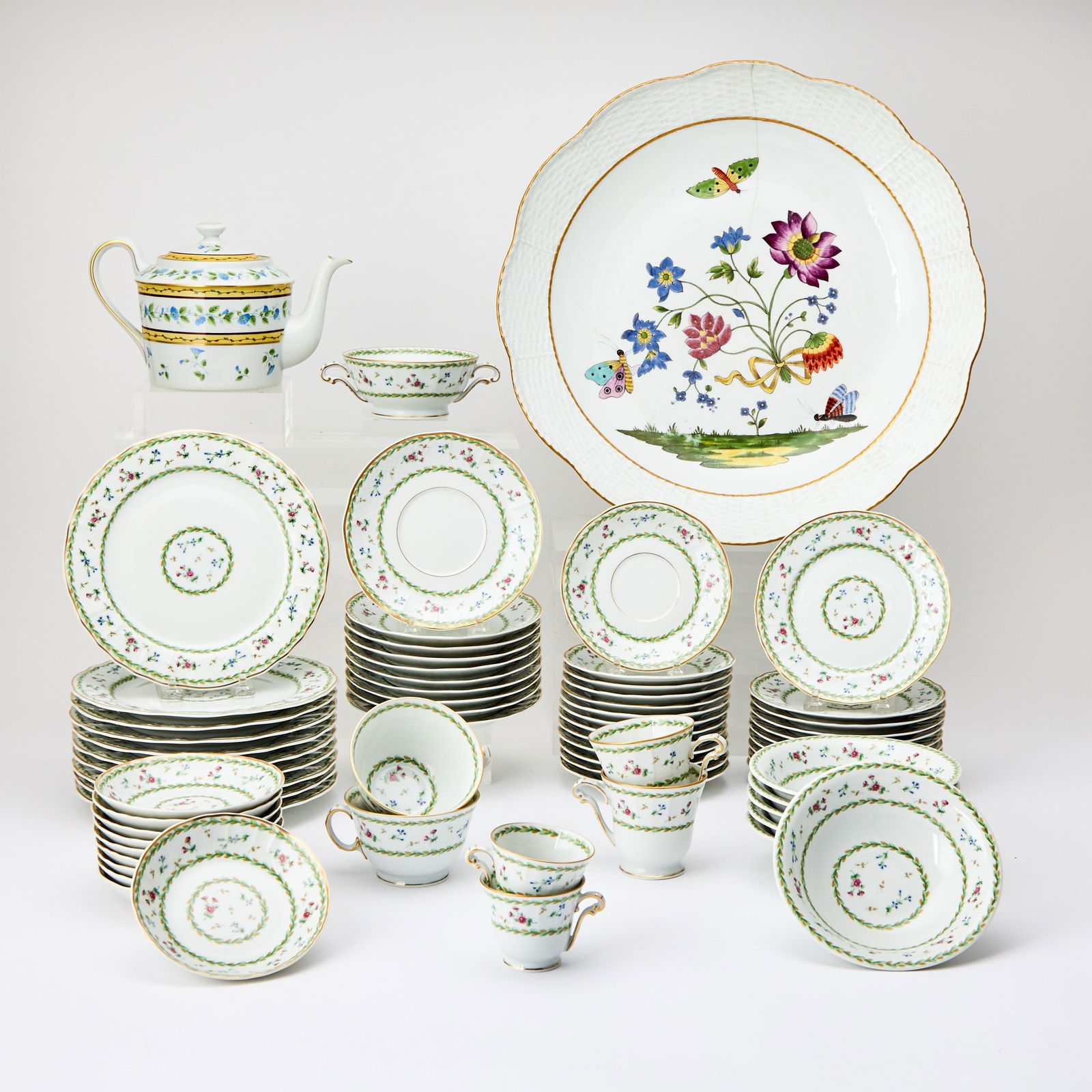 Bernardaud Limoges Porcelain "Artois" Pattern Dinner Service: Comprising ten plates, diameter 8 1/2 inches; ten plates, diameter 6 1/2 inches; six small bowls; ten saucers, diameter 6 1/2 inches; thirteen saucers, diameter 6 inches; two teacups; two demitasse cu