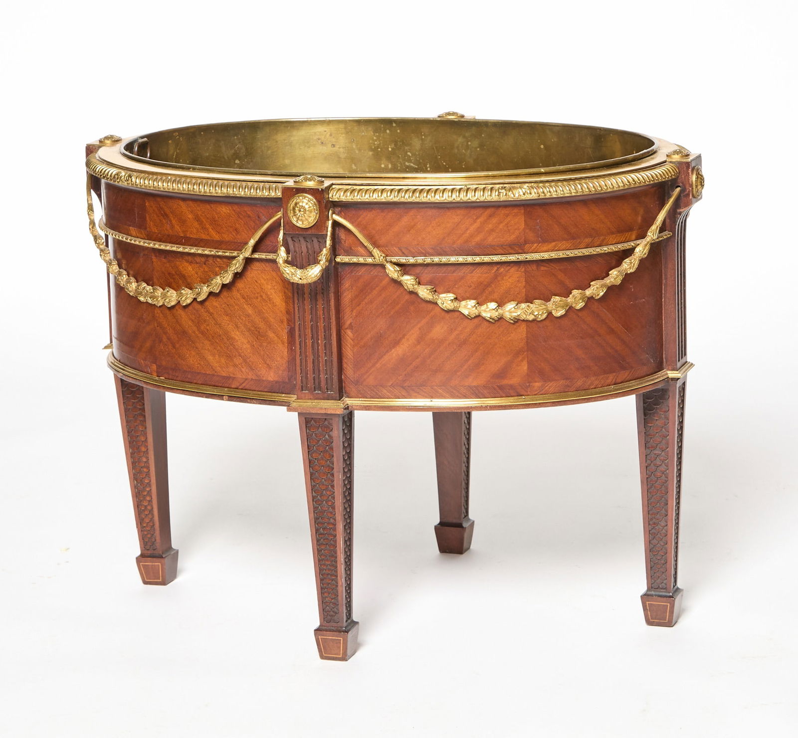 George III Style Gilt Metal Mounted Mahogany Cellaret Made by Morison & Co., Edinburgh, early 20th: In the style of Thomas Chippendale, stamped underneath by "Morison & Co. Edinburgh," renowned furniture makers since 1808. Height 22 1/2 inches, width 30 1/2 inches, depth 22 3/4 inches.