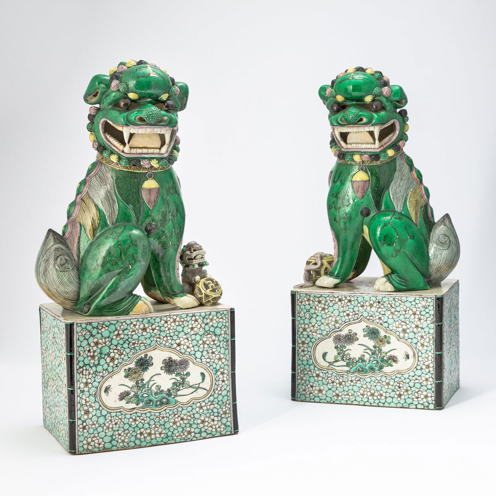 A Pair of Chinese Famille Verte Porcelain Fu Lions 19th century (1 of 8)