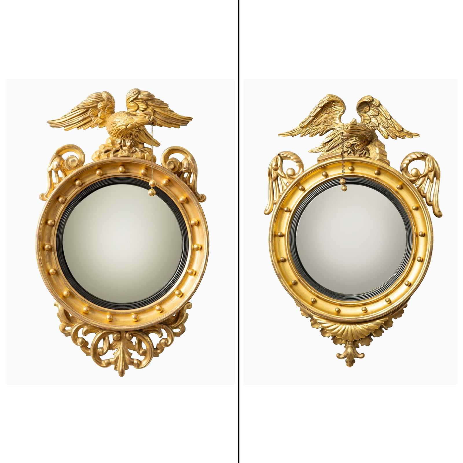 A Pair of Classical Giltwood Convex Mirrors Circa 1830: The top with an eagle crest. Height 40 1/2 inches, width 24 1/2 inches