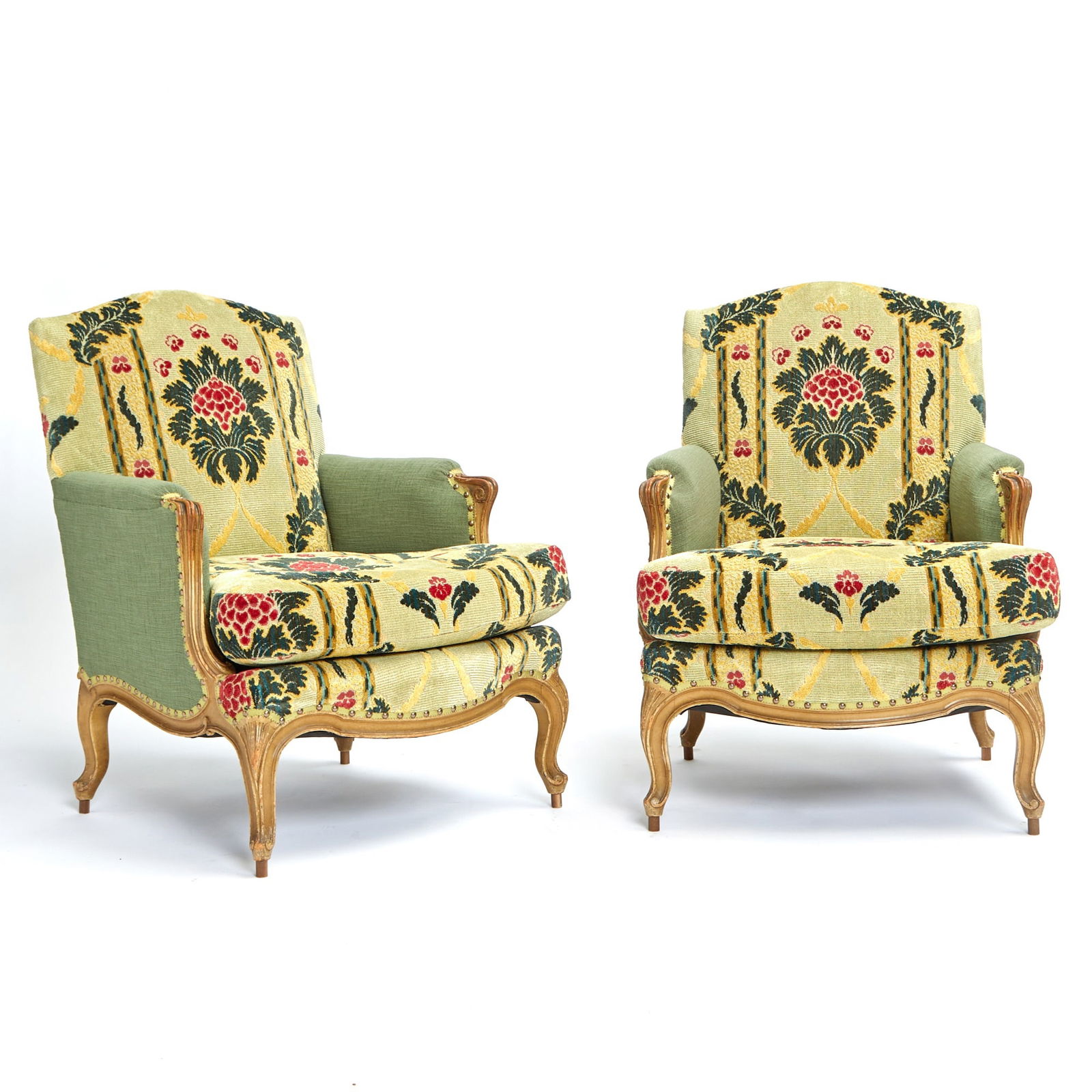 Pair of Louis XV Style Painted Bergeres: The padded back, seat and sides within a molded frame, the shaped apron on cabriole legs. Height 34 3/4 inches (88.3 cm), width 25 1/2 inches (64.7 cm), depth of seat 21 1/2 inches (54.6 cm)