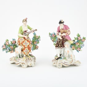Pair of Chelsea Style Porcelain Bocage Figures of Musicians Late 19th century, spurious gold anchor