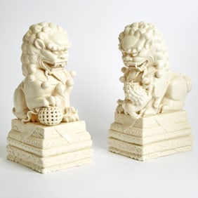 Pair of Chinese White Glazed Porcelain Foo Lions 20th Century