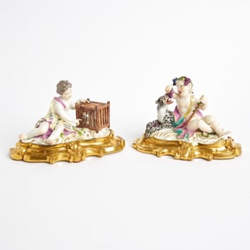 Two Meissen Porcelain Gilt-Bronze Mounted Figures of Putti Emblematic of Taste and Touch Circa 1760,