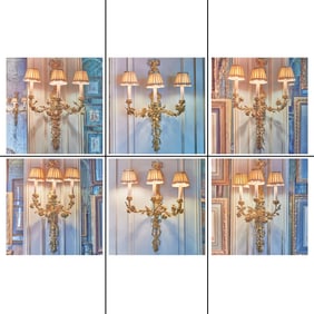 Set of Six Louis XVI Style Gilt Metal Floriform Three-Light Sconces