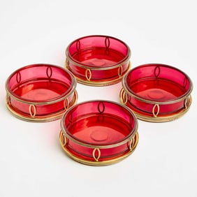 Set of Four George III Sterling Silver Gilt Bottle Coasters