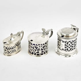 Three English Sterling Silver and Blue Glass Mustard Pots