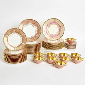 Three Sets of Coalport Porcelain Pink-Ground Gilt Plates