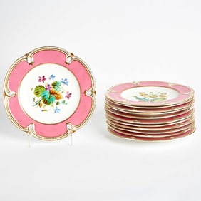 Twelve George Jones Porcelain Pink-Ground Pierced Specimen Dessert Plates