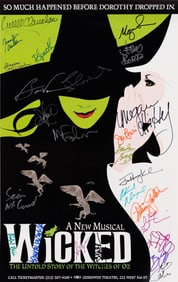 A cast-signed poster for Wicked