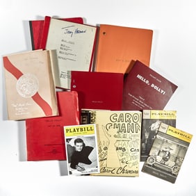 A stack of scripts for Jerry Herman's best-loved musicals