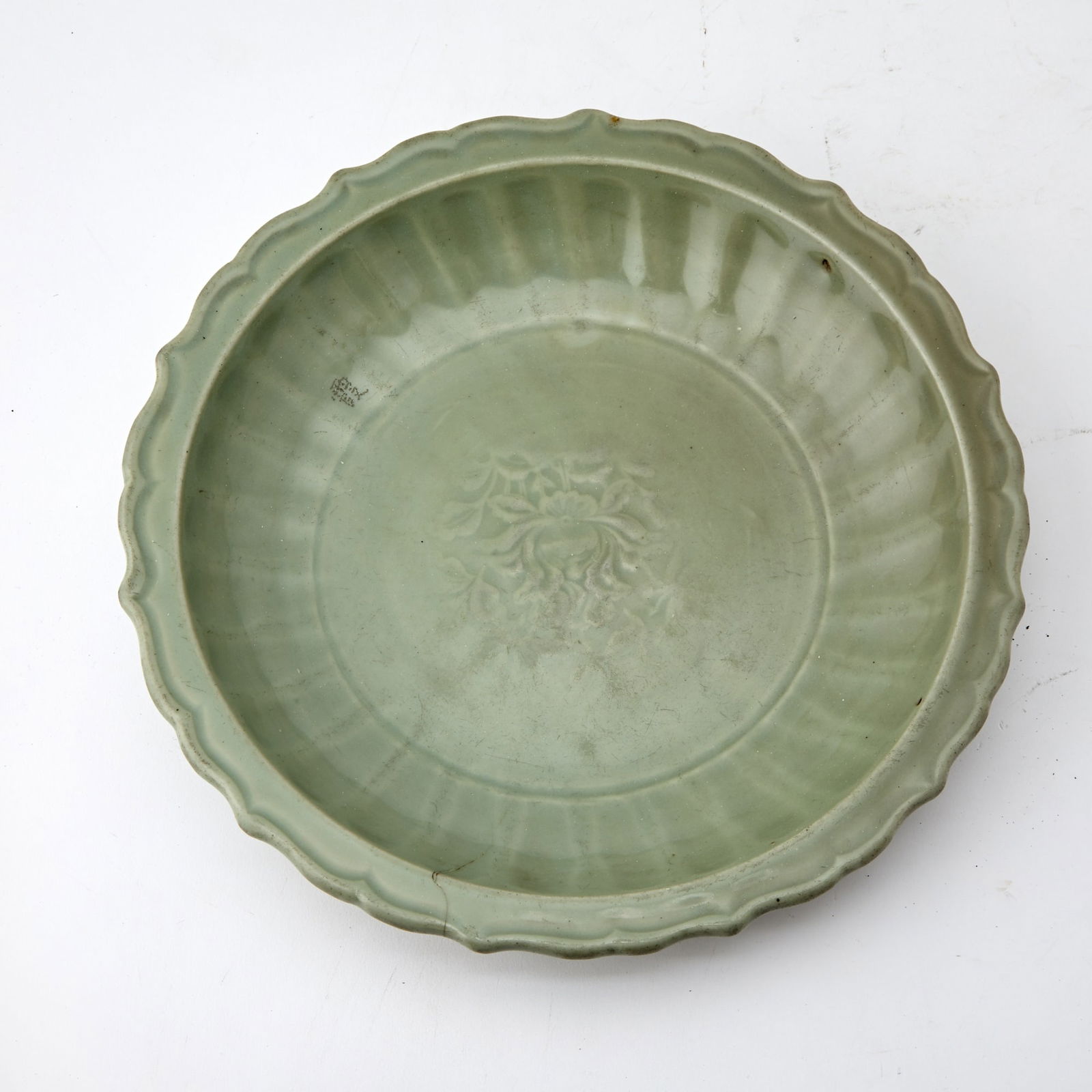 A Chinese Longquan Celadon Glazed Barbed Rim Plate (1 of 4)