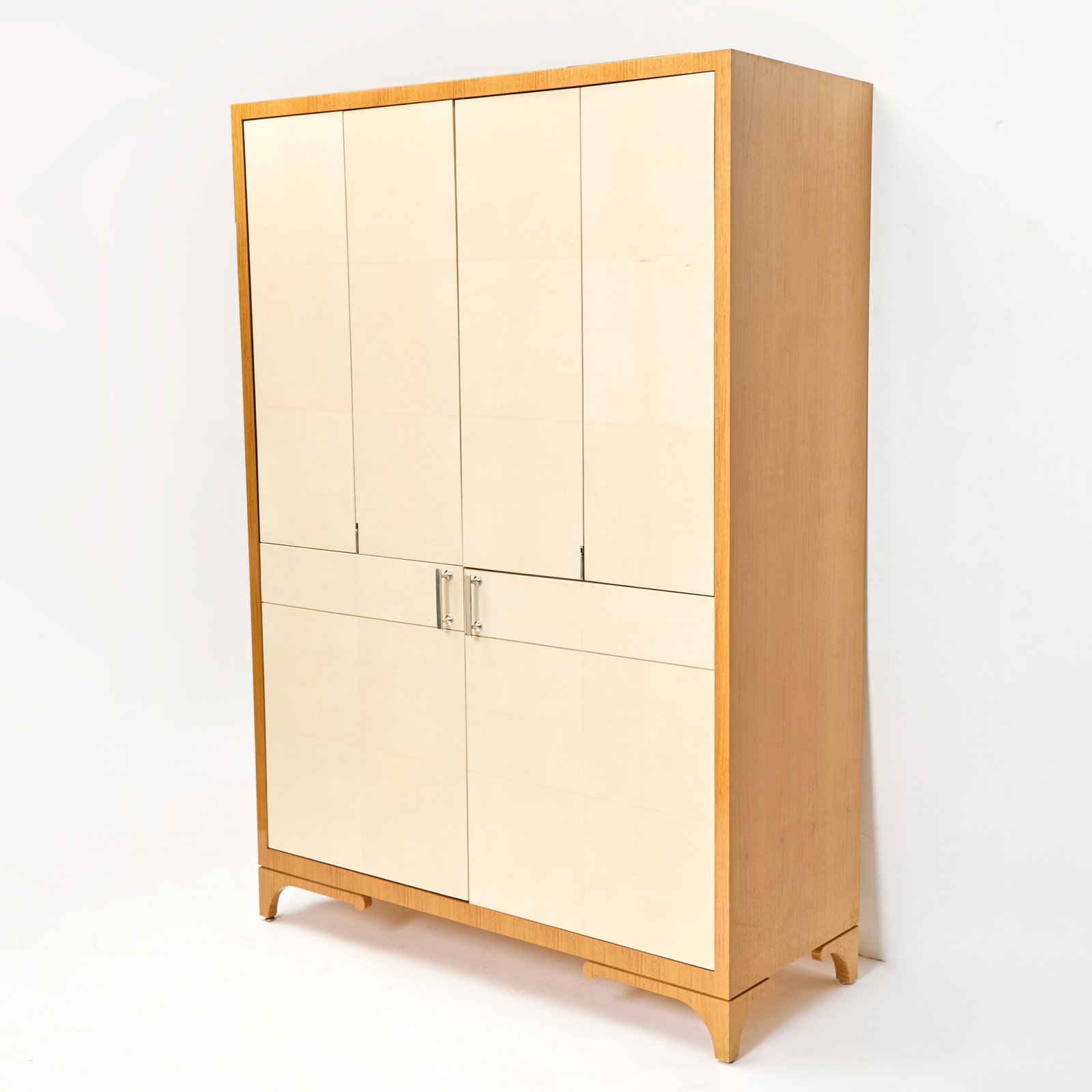 Figured Anigre Wood and Parchment Armoire: Estate / Collection: Property From a Manhattan Apartment Decorated by David Kleinberg Height 7 feet, width 60 inches, depth 22 inches.