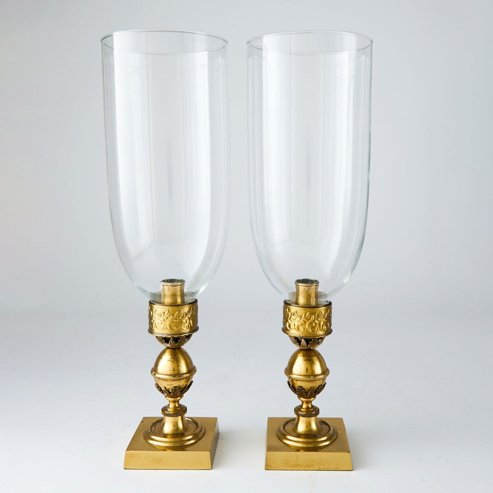 Pair of Empire Style Brass Photophores: With hurricane glass shades. Height 15 1/2 inches