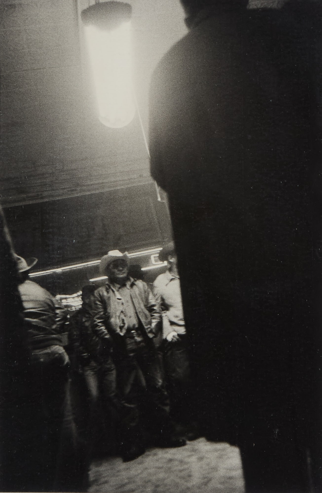 Robert Frank, Bar, Gallup, New Mexico. 1956: ROBERT FRANK (1924-2019) Bar, Gallup, New Mexico. 1956, printed circa 1970. Gelatin silver print, 12 x 8 inches (305 x 203 mm) on larger sheet, with Frank's signature, partial title, and negative date