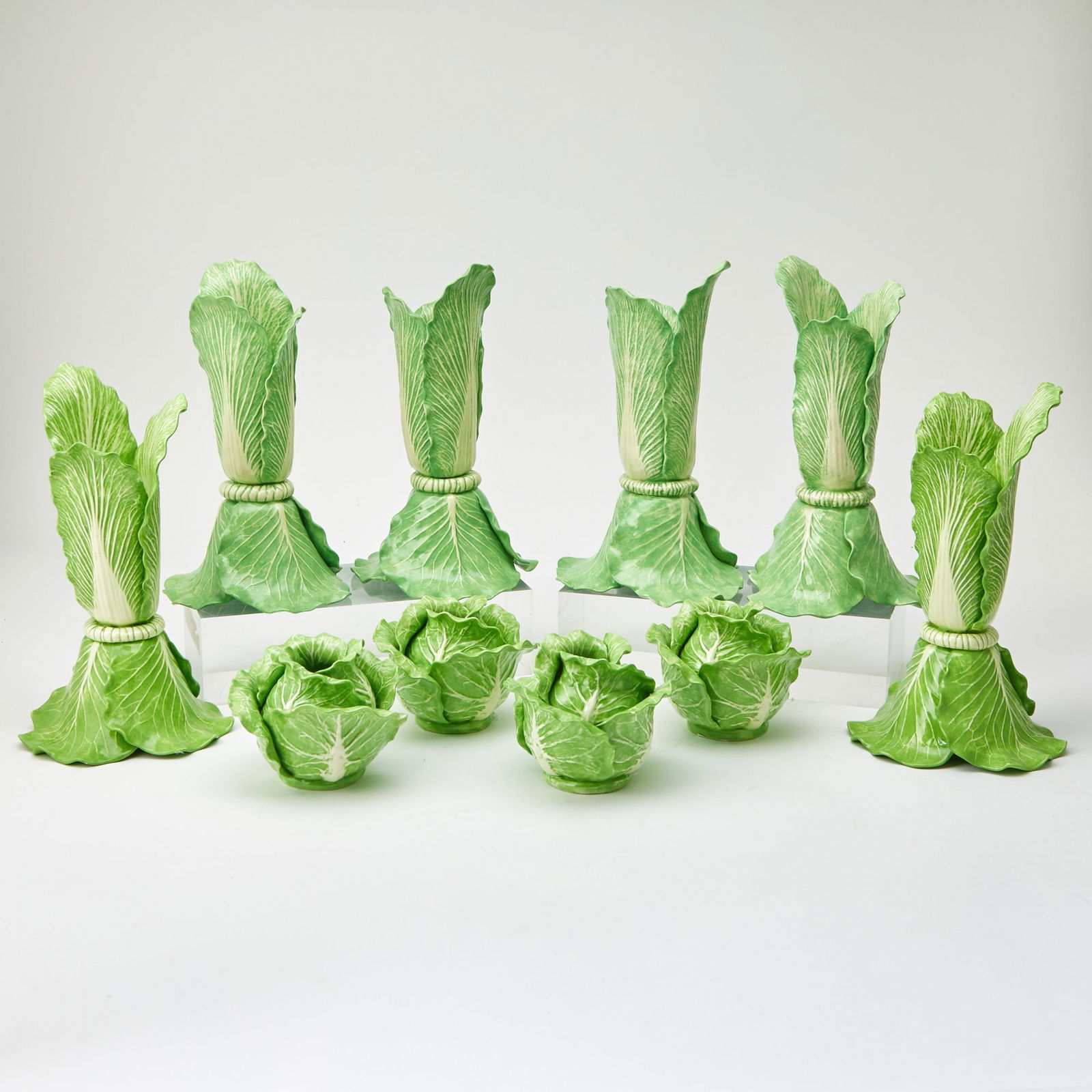 Group of Dodie Thayer Lettuceware Candlesticks: Late 20th Century Estate / Collection: The Collection of Joanne B. Breyer Comprising a set of six taller candlesticks and a set of four smaller candlesticks Height of larger candlesticks 11 1/4 inches