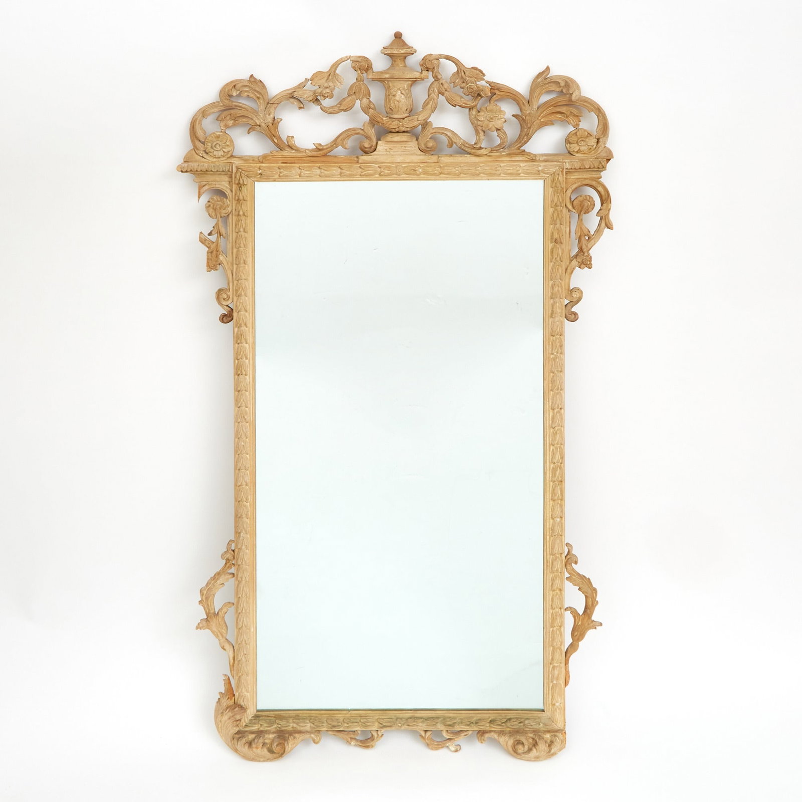 Louis XVI Style Painted Mirror: Estate / Collection: The Collection of Joanne B. Breyer The rectangular mirror plate within a bellflower-carved frame with urn and foliate swag cresting. Height 5 feet 3 1/2 inches, width 34 1/2 inche