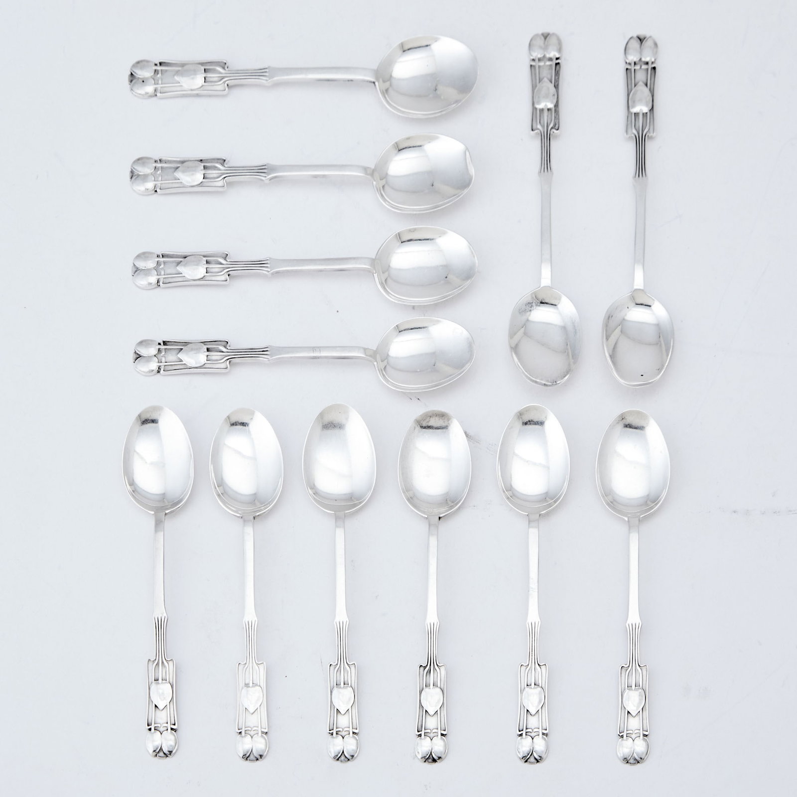 Set of Twelve George V Sterling Silver "Medea" Pattern Teaspoons Archibald Knox for Liberty & Co., (1 of 4)