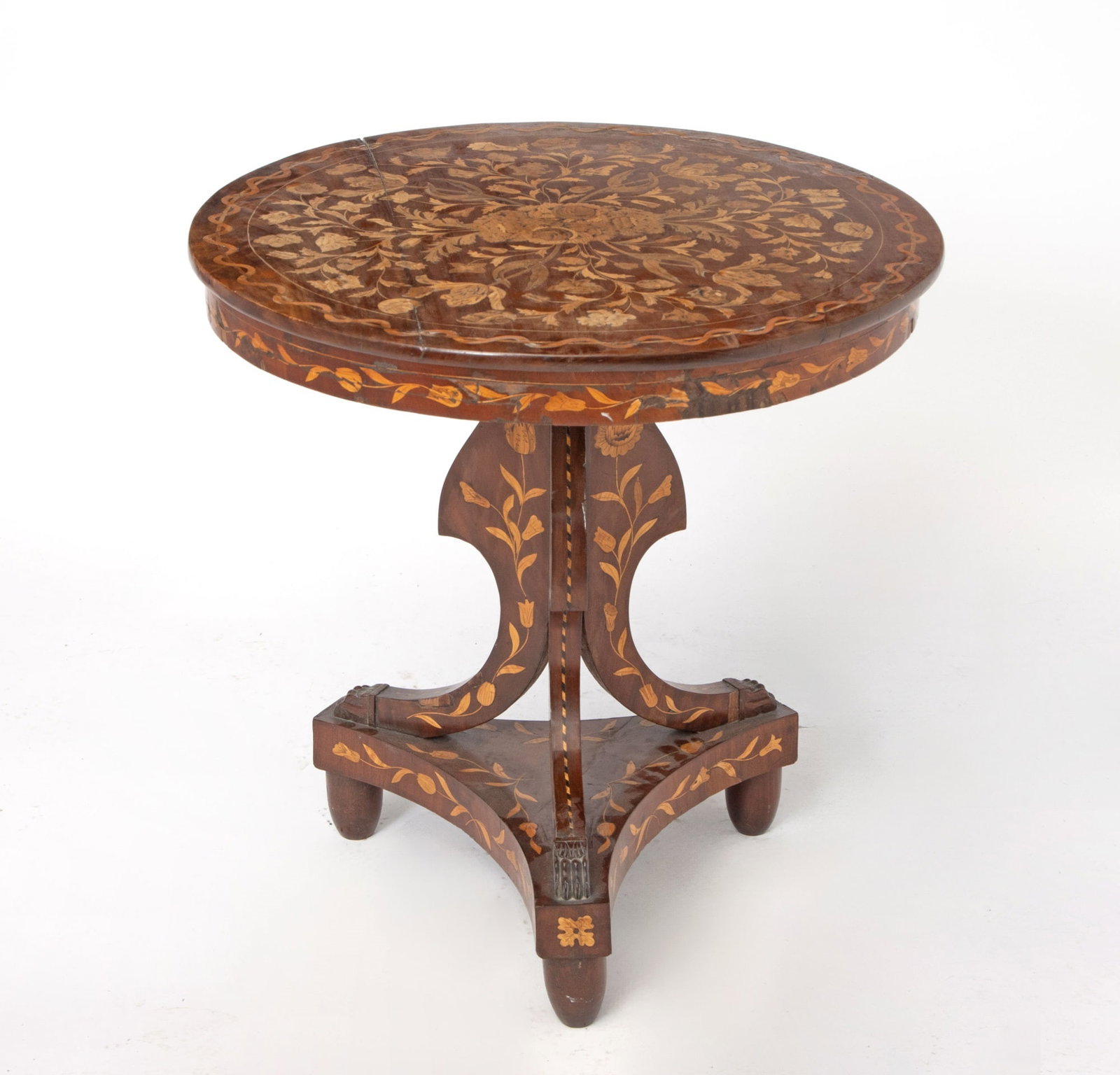 Dutch Mahogany Marquetry Center Table: Height 29 1/2 inches, diameter 29 1/2 inches. veneer losses; fading; cracking; veneer replacements; edgewear