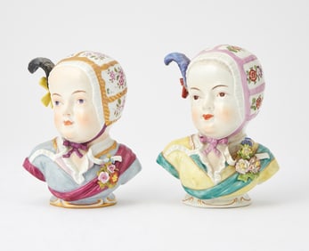 Two German Gilt and Polychrome Decorated Porcelain Busts of Young Girls