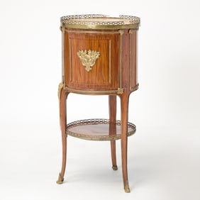 A Late Louis XV Gilt-Bronze Mounted Tulipwood Table en Chiffoniere