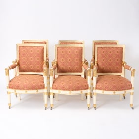 Set of Six Restauration Upholstered Parcel Gilt Painted Wood Armchairs, decoration of later date