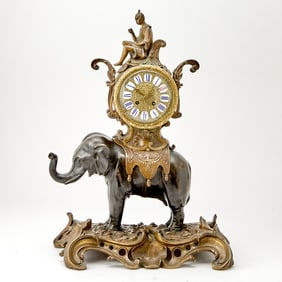 A Louis XV Style Gilt and Patinated Bronze Elephant Clock
