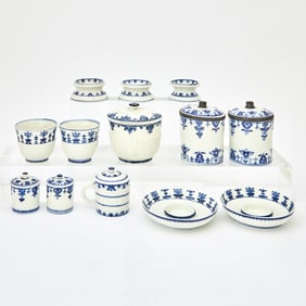 Group of Thirteen Saint Cloud Blue and White Soft Paste Porcelain Table Articles