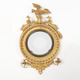 Regency Giltwood and Ebonized Convex Girandole Mirror