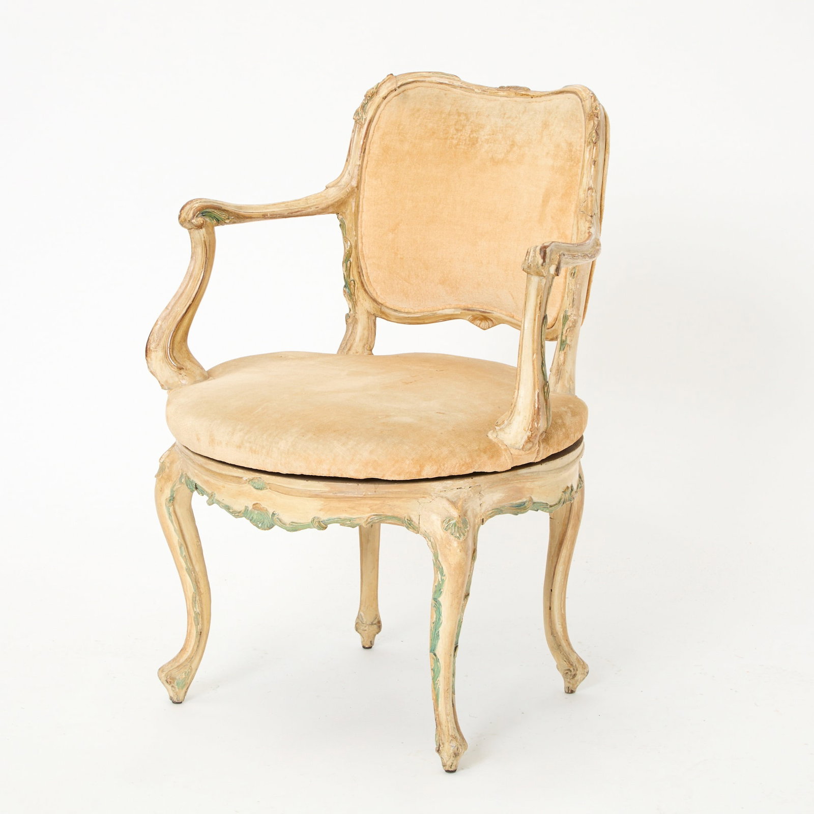 Venetian Rococo Polychrome-Painted Desk Armchair: Estate / Collection: The Dalva Brothers Collection Mid-18th century The padded back within a shell-carved frame above a rotating circular seat flanked by shaped arms, the shell-carved apron on cabriol