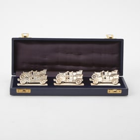 Cased Set of Six Elizabeth II Sterling Silver Novelty Place Card Holders
