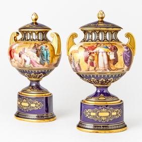 Pair of Vienna Style Cobalt-Blue and Gold Ground Porcelain Urns and Covers on Pedestals