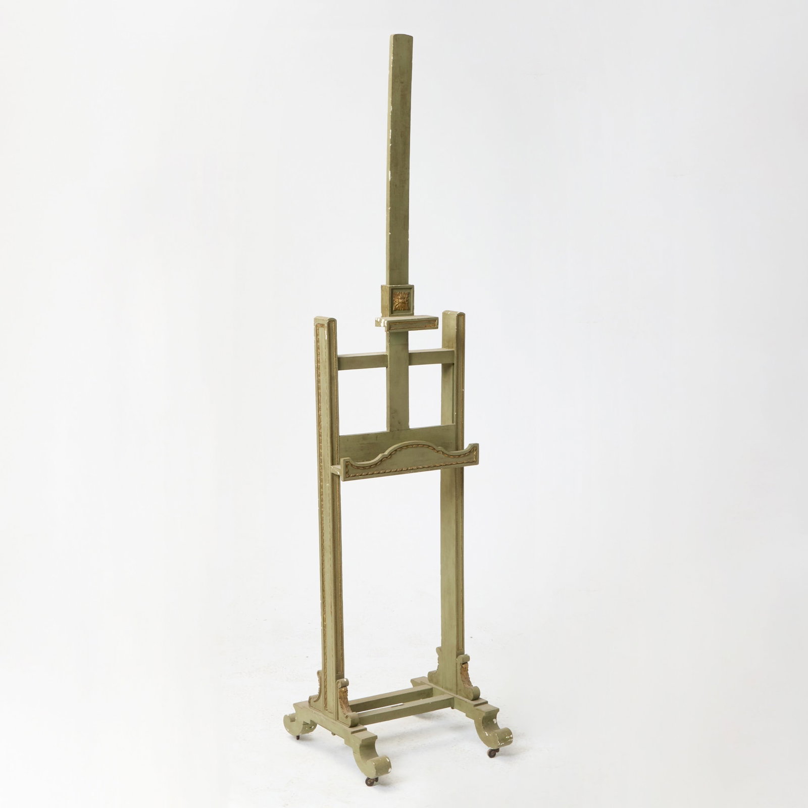 Louis XVI Style Green Painted Easel: Height 90 inches (228.6 cm), width 20 5/8 inches (52.3 cm), depth22 inches (56 cm).