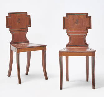 Pair of Regency Mahogany Hall Chairs: Height 33 1/2 inches, width 16 3/4 inches, depth of seat 14 inches. Provenance: Norman Adams, London cracks to seats; repairs to legs; old marks and scratches; scuffs and wear