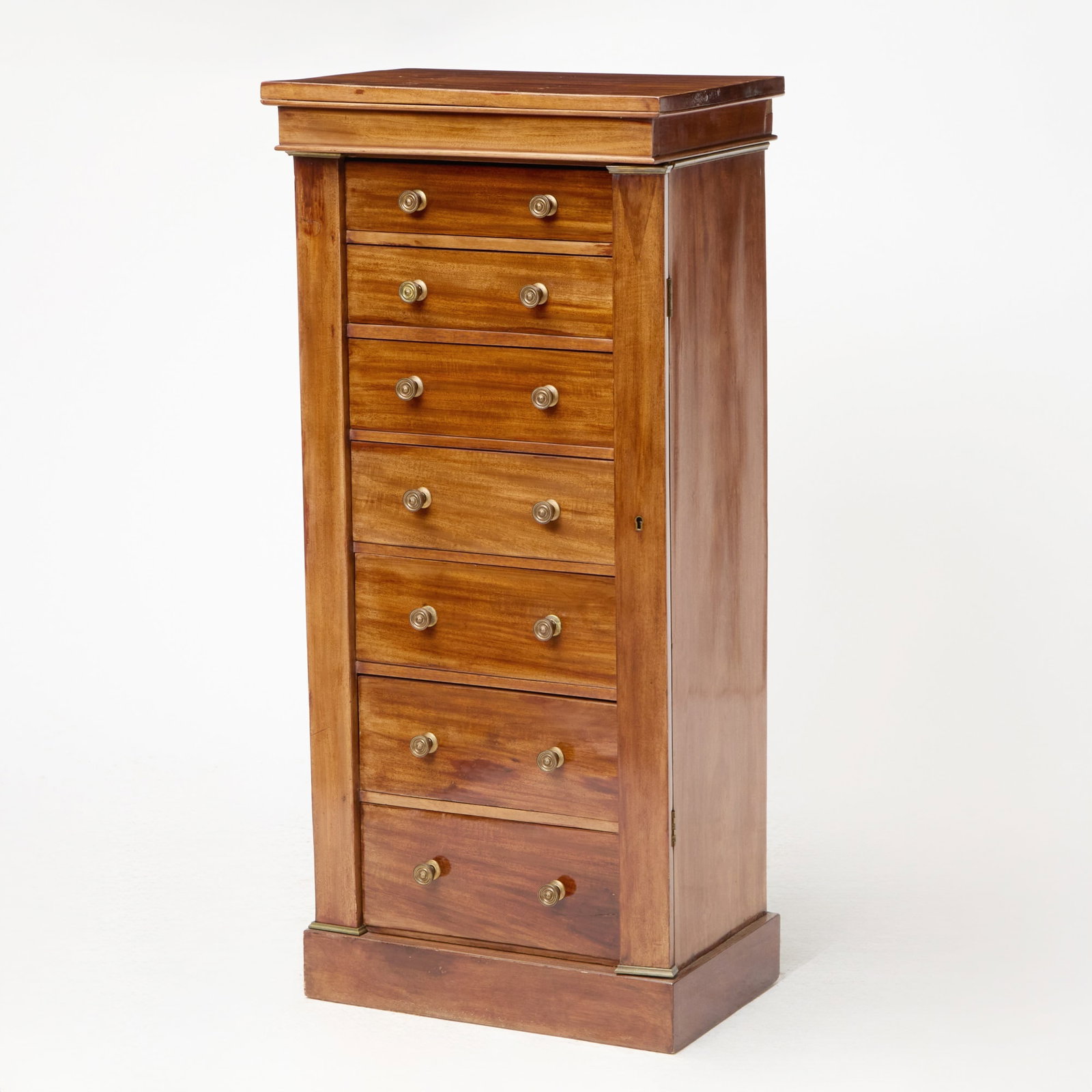 Victorian Mahogany Wellington Chest of Drawers: Height 45 3/4 inches, width 21 inches, depth 14 1/2 inches. edgewear; large crack to left side; veneer repairs; areas of infill