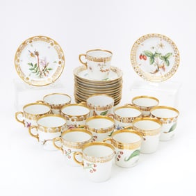 Fourteen Royal Copenhagen Flora Danica Style Floral Decorated Porcelain Demitasse Cups and Saucers