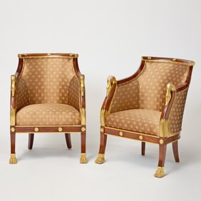 Pair of Empire Style Parcel Gilt Stained Beechwood Bergeres