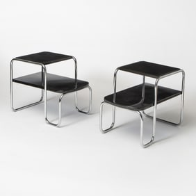 Pair of Gilbert Rohde Chromed Steel and Black Laminate Two-Tier Tables