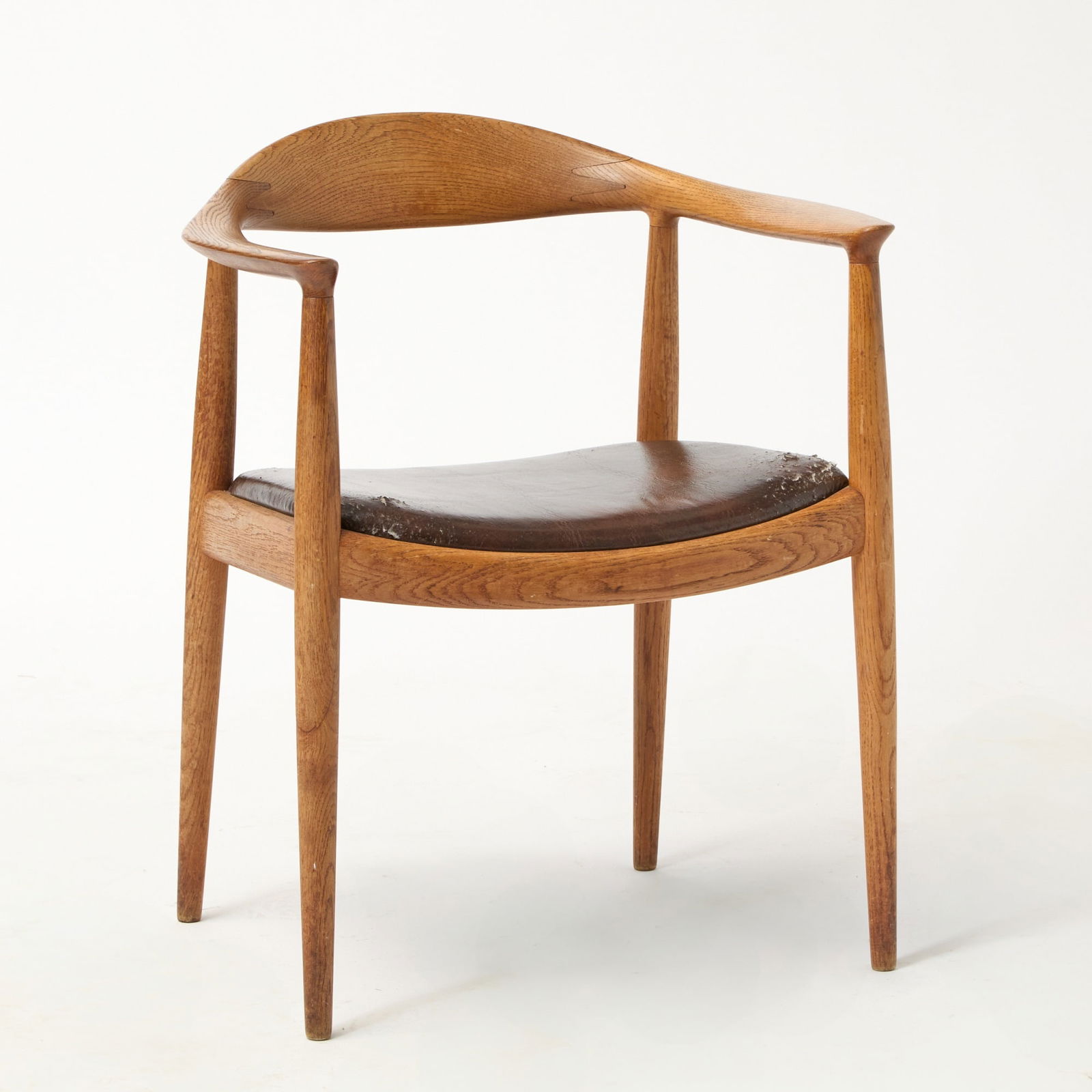 Hans Wegner for Johannes Hansen Oak and Upholstered "The Chair" Armchair: Mid 20th century Height of back 29 3/4 inches, height of seat 17 inches, width 24 3/4 inches, depth 20 inches.