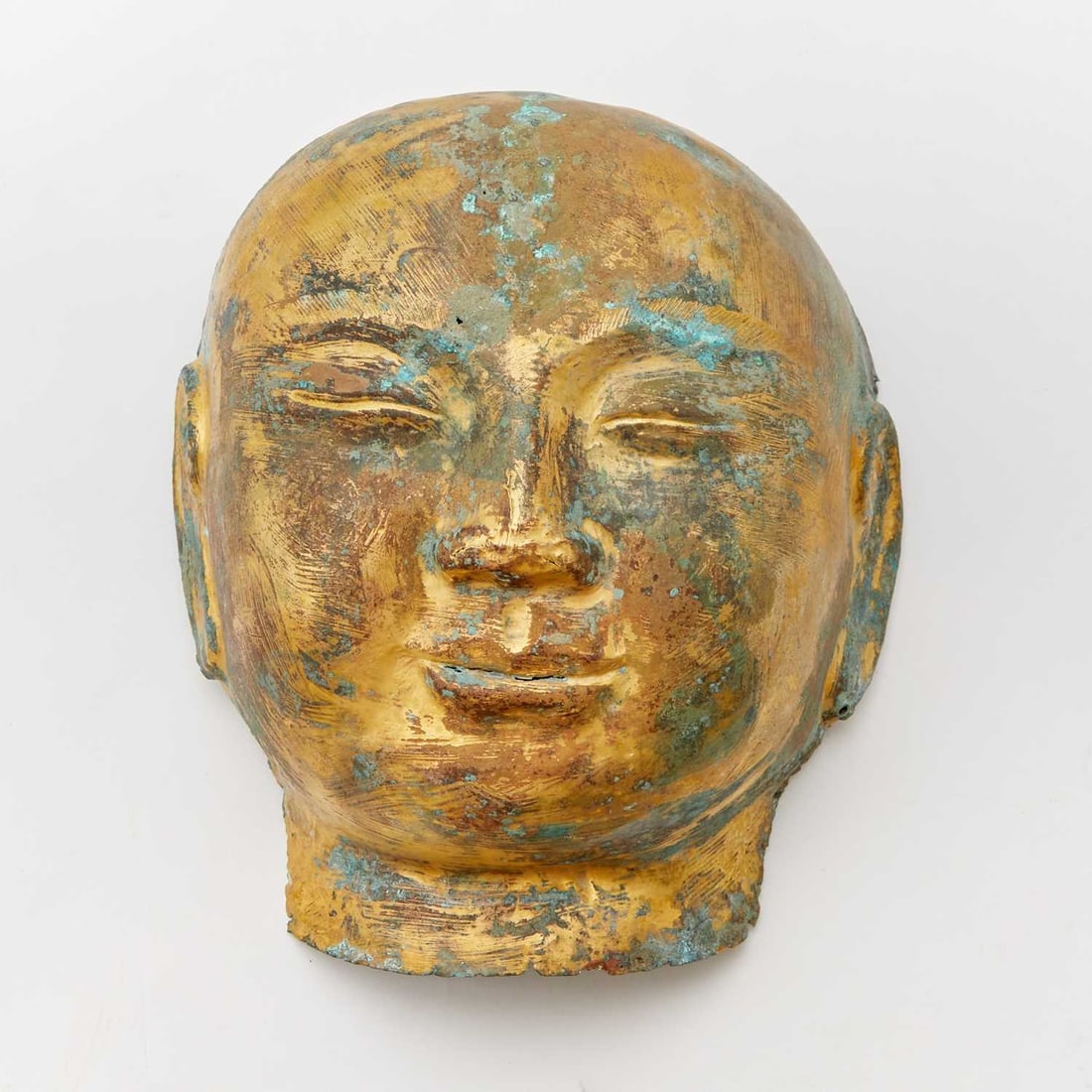 A Chinese Gilt Copper Funerary Mask Possibly Liao Dynasty (1 of 3)