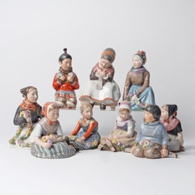 Group of Nine Royal Copenhagen Porcelain Figures of Danish Children in Regional Costume